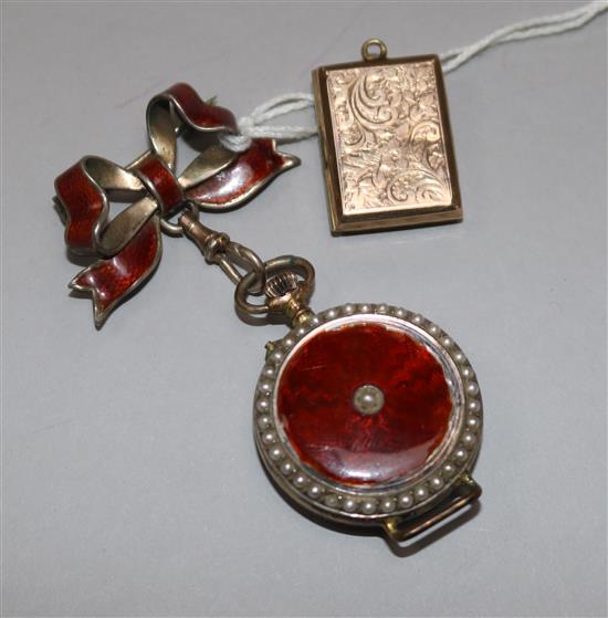 An early 20th century silver gilt & enamel fob watch with suspension brooch and a yellow metal locket.